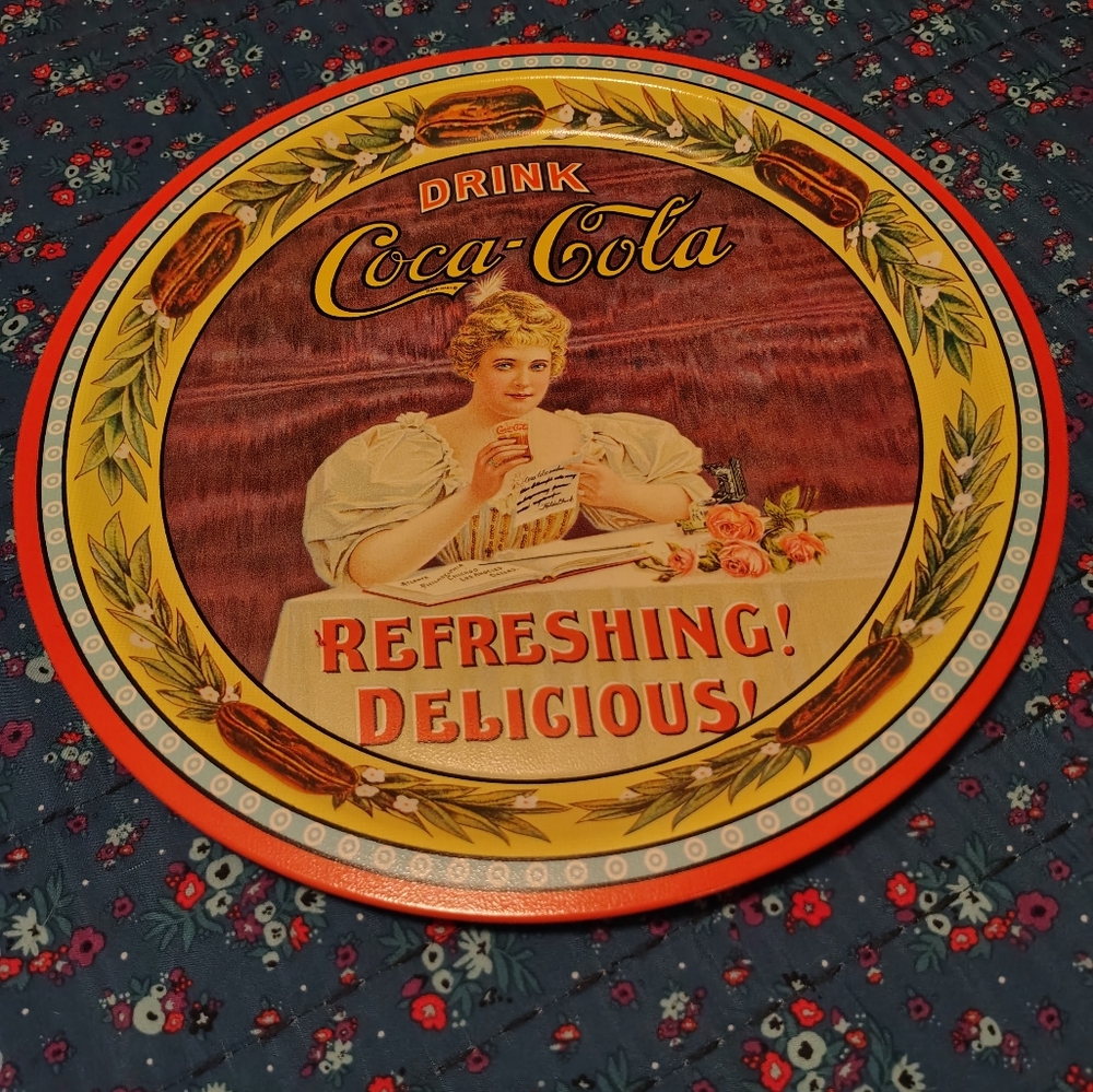 Coca-Cola Commemorative Plate with Gold and Red Accents